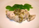 Poached fish in wine